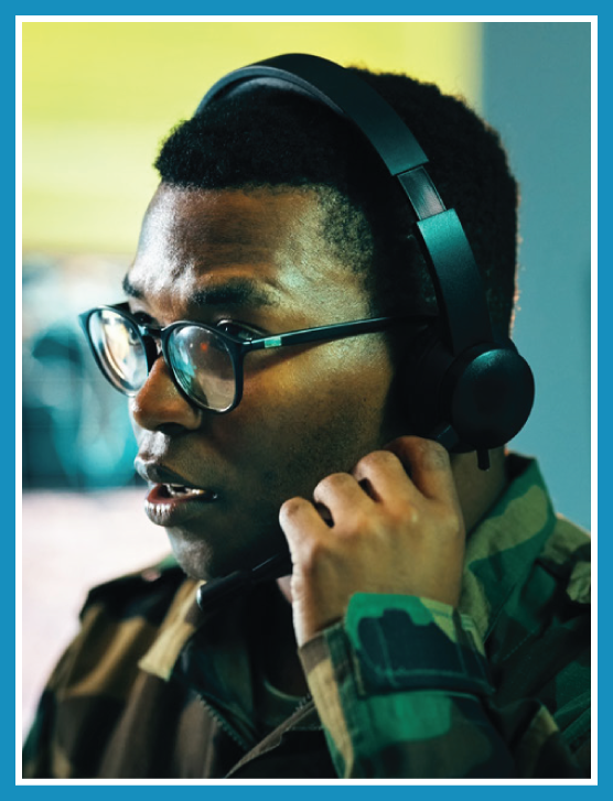 Government official with a headset on in the middle of a conversation