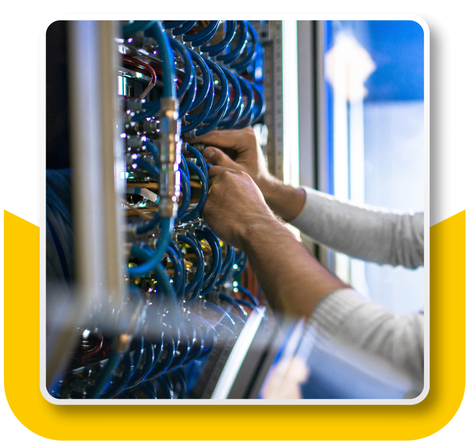 Framed Image: close-up of a technician actively arranging cables into an infrastructure unit
