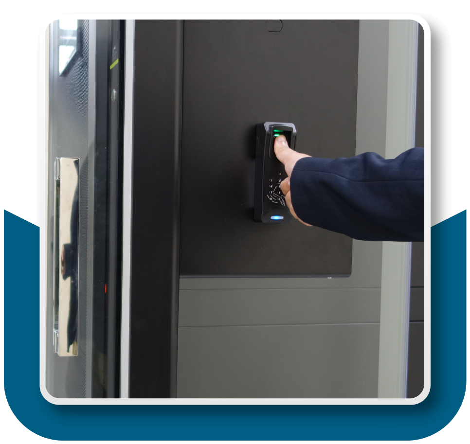 Framed Image: Close-up of a person using a biometrics access control system to access a sensitive data server room